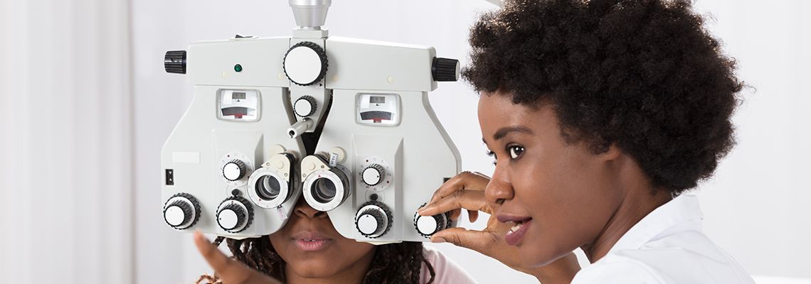 Ophthalmologist conducing an eye exam