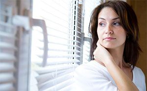 Woman looking out of the window