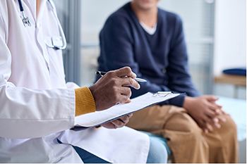 Doctor holding clipboard