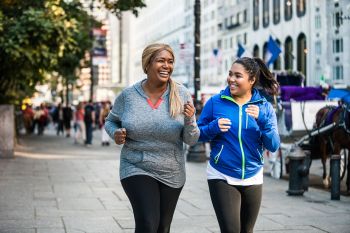 Two women running for exercise
