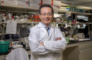 Photo of researcher Rong Li in his lab. 